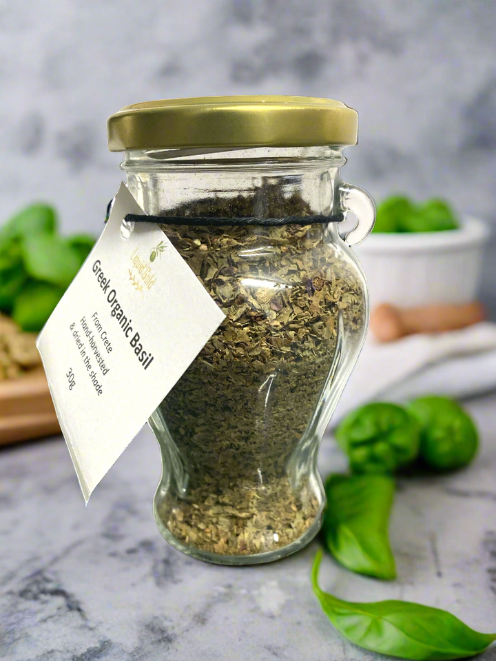 glass jar containing dried Greek basil leaves, from Crete