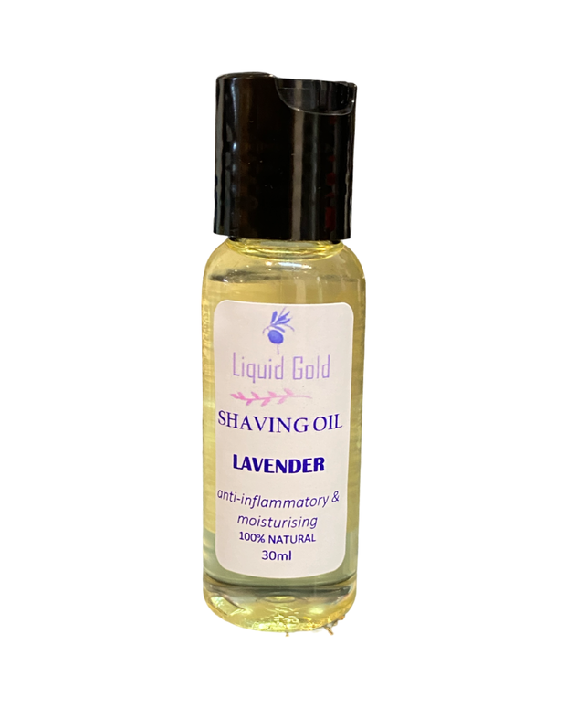 Bottle of Liquid Gold Lavender Shaving Oil on a white background
