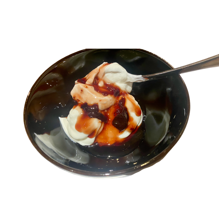 Greek black sour cherry preserve on Greek yogurt