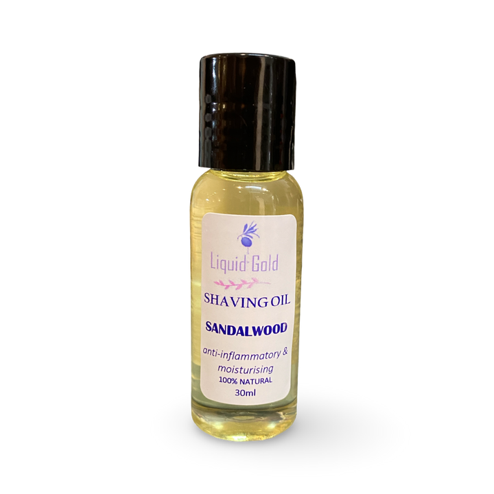 Bottle of Liquid Gold Sandalwood shaving oil 