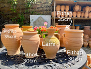 Cretan ceramic pots - pithoi and pithari, and Laini of different sizes