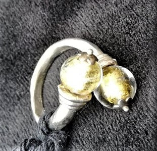 Solid silver ring, with murano glass encasing two gold leaf beads, hand made in Greece
