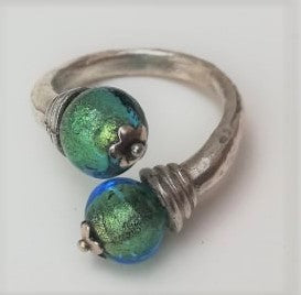 Solid silver ring, with blue-turquoise murano glass encasing two gold leaf beads, hand made in Greece