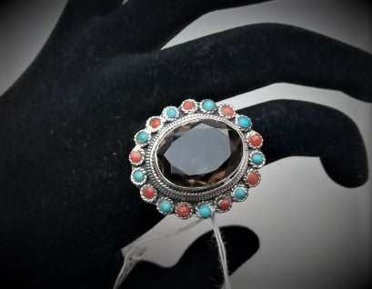 Solid silver ring with large central smokey quartz stone surrounded by turquoise and red coral beads, hand made in Greece