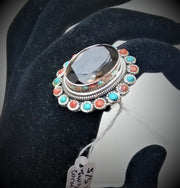 Solid silver ring with large central smokey quartz stone surrounded by turquoise and red coral beads, hand made in Greece
