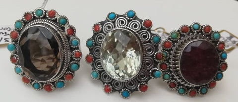 solid silver hadn made rings with huge semi-precious gemostone surrounded by turquoise and red coral beads