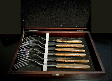 Boxed set of hand made premium stainless steel forks with handles made of olive wood