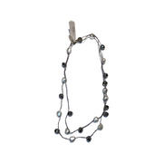 Cut stone and fresh water pearl necklace on silver crocheted thread, long, black and white