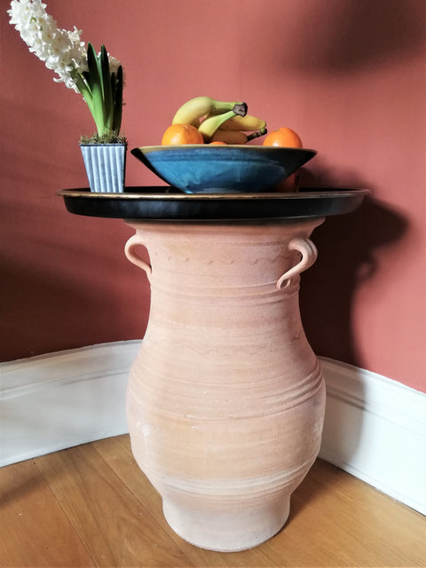 Cretan bogaziopitharo pot serving as a table base with fruit tray top